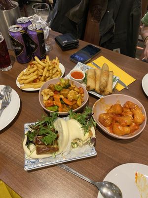 Bao buns, fries, spring rolls, sweet n sour ch’cken  at Lotus Plant Based Kitchen in Manchester