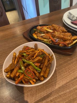 Crispy Szechuan beef (left) Cantonese beef (right)   at Lotus Plant Based Kitchen in Manchester