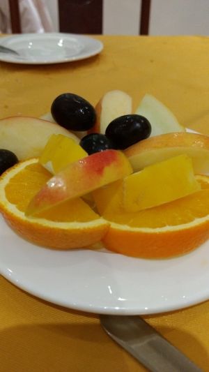 free fresh fruit with pudding at Lotus Plant Based Kitchen in Manchester