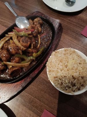 Black pepper chikn with ginger fried rice at Lotus Plant Based Kitchen in Manchester