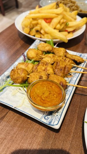 Satay mock chicken with salt n pepper chips   at Lotus Plant Based Kitchen in Manchester