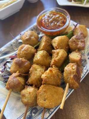 Satay chicken skewers   at Lotus Plant Based Kitchen in Manchester