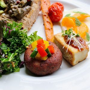 A colorful assortment of side dishes, beautifully plated like edible art at PLANT KITCHEN TOKYO - プラントキッチン東京 in Tokyo
