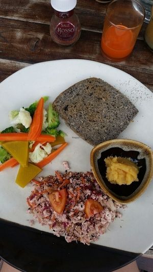 tofu scramble with steamed veg, homemade bread, applesauce, and fresh carrot juice! at June's Art Cafe in Koh Samui