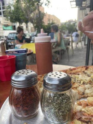 Dried chilli and herbs with chilli sauce   at Hatool HaYarok - The Green Cat in Tel Aviv