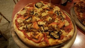 Seitan, eggplant and tomato pizza (with cashew cheese) at Hatool HaYarok - The Green Cat in Tel Aviv