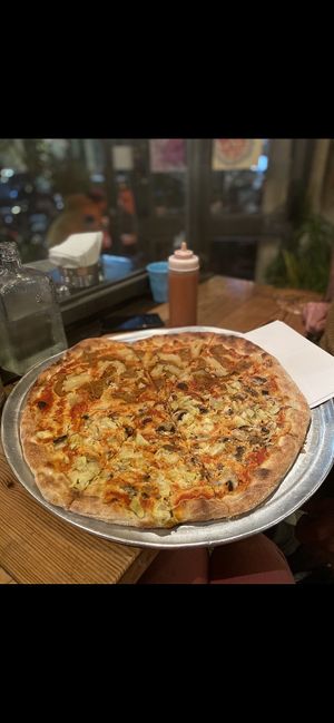 Best pizza in Tel Aviv ❤️ at Hatool HaYarok - The Green Cat in Tel Aviv