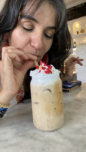 Vegan coffee with plant milk and vegan creamm  at Conscious Cafe in Auroville