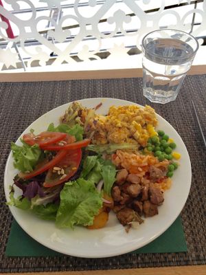 Spiritual tofu, soya bites, roasted mixed veg, salad, tomato rice, peas and corn at Cultura Dos Sabores in Porto