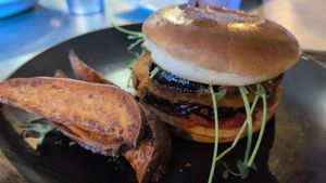 Eggplant burger with tomato jam and a side of sweet potatoes at Kool Beanz Cafe in Tallahassee