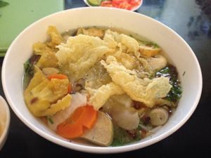 noodle soup with rice pancake, veg, tofu at Dieu Phap Chay in Ho Chi Minh City
