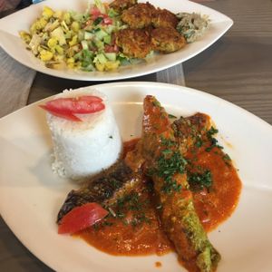 Couscous stuffed vine leaves; falafel mezze. at Selly's Vegan Bar in Passau