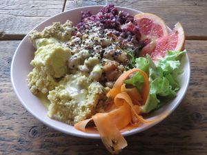 Love Bowl, gluten-free (red cabbage and hazelnut salad, pink grapefruit, lettuce, shaved carrots, millet, chickpea hummus, and white beans sprinkled with black sesame seeds) at Moehren Milieu Eco Cafe in Mainz