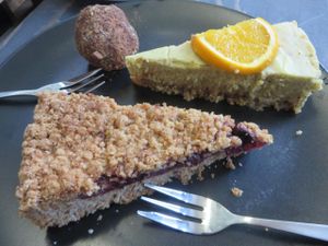 spelt cherry streusel cake, orange and chai tart (raw), and energy ball at Moehren Milieu Eco Cafe in Mainz