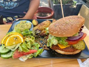 Kidney bean burger with potato wedges.  at Moehren Milieu Eco Cafe in Mainz
