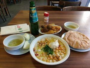 Massabahs with chickpeas on top and like 2 tbsp of regular hummus.  at Abu Hassan - Jaffa in Tel Aviv