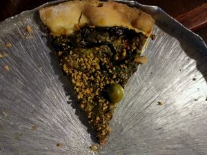 A slice of the Pesto pizza at Barao Natural  at Barao Natural - Campos Eliseos in Sao Paulo