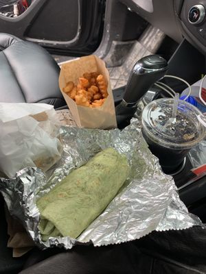 Breakfast burrito and cheese burger with lg fries and a drink (did munch on fries 🤤 they’re seasoned and fantastic!)  at Earth Burger - NW Loop in San Antonio