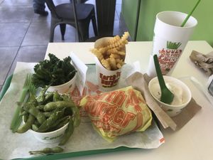 Edamame, kale salad, earth burger, fries, soft serve at Earth Burger - NW Loop in San Antonio