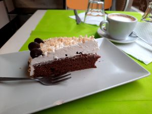 Vegan cake and Cappuccino at Alhambra Cafe in Milan