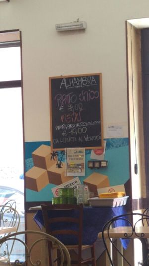 the menu at Alhambra Cafe in Milan