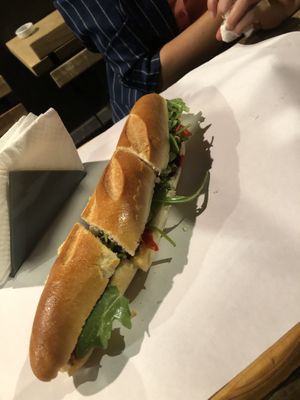 Baguette con rucola, sottoli (melanzane, peperoni e zucchine), capperi, olive e cumino   at Bi e B - Birre e Baguettes in Campania