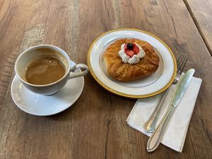 Latte and fruit pastry at Délice de Bernay in New York City