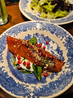 Baked pumpkin with pomegranate seeds (not vegan labneh) at Boulevard Restaurant & Bakery in Samarqand Viloyati