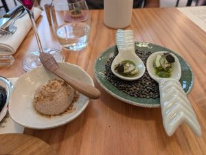 Starter. Walnut butter and bread (not pictured) and a refreshing cucumber bite at Trèfle in Lyon