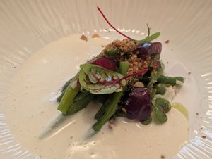 Green beans, crushed hazelnut etc with an ajo blanco sauce at Trèfle in Lyon