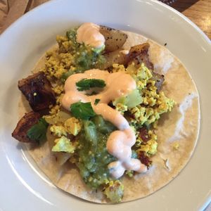 really scrumptious taco called The Primitive-potatoes with tofu scramble, cashew crema and tomatillo salsa at Chimera Cafe in Tulsa