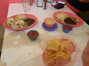 Vegan queso, puffy tacos and tomatillo enchiladas   at Elote Cafe in Tulsa