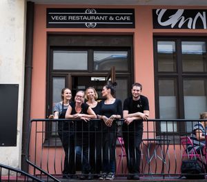 OmNam staff welcomes you to the inner yard at OmNam in Helsinki