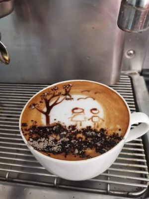 vegan coffee with beautiful art at Pumpernicle German Bakery in Rishikesh