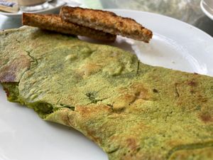 The spinach and mushroom omelette and dry toast.  at Pumpernicle German Bakery in Rishikesh