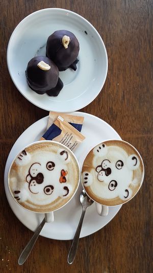 Vegan reeses ball and cocomilk capuccino at Pumpernicle German Bakery in Rishikesh