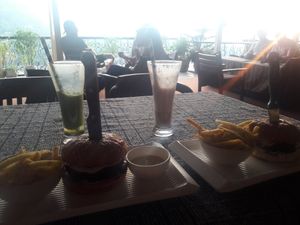 Burger and a Perfect view at Pumpernicle German Bakery in Rishikesh