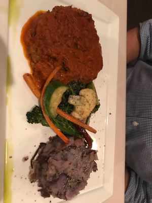 Vegan meatloaf w veggies and potatoes  at Cedar Restaurant in Washington