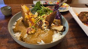 Roasted cauliflower curry with the tofu chicken at Seoul Food DC in Takoma Park