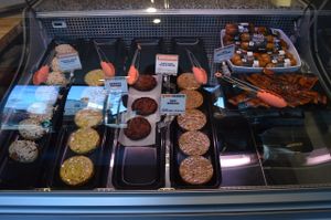 Vegan burgers, sausages, ribs, and chick'n parm. at Yam Chops in Toronto