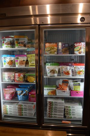 Frozen vegan meats, pizzas, "Hot Pockets," burgers, and fries. at Yam Chops in Toronto