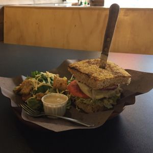 The Backyard BBQ burger and Caesar salad - you can hardly see the patty buried in there! at Boon Burger Cafe in Barrie