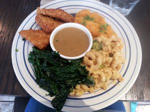 Veggielicious meal! Deep fried tempeh wings, sweet potato mash, garlic braised kale, gravy, and mac n cheese. 

Meal was topped off with a personal pecan pie and ice cream for dessert. at bloomer's in Toronto