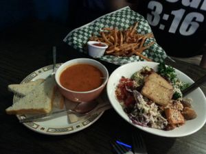 Soup of the day (spicy tomato I believe), French fries, and the 'other' bowl. YUM. at bloomer's in Toronto