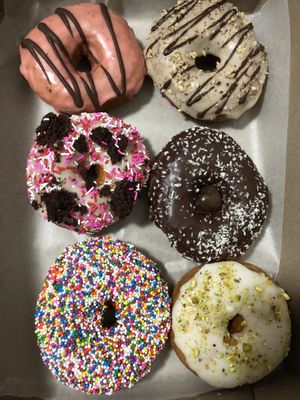 Mixed donuts. Favourite is the rose pistachio and some of the seasonal ones.   at bloomer's in Toronto