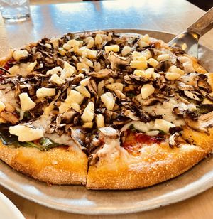 Created own with mushroom, spinach, and pineapple. Vegan crust and cheese - yum!  at Blue Line Pizza in San Carlos