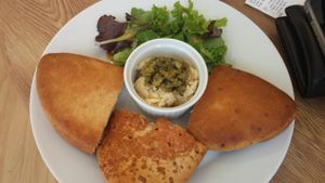 Homemade hummus served with hot, just toasted, tascas.  Delicious! at Daisy Moo's Bakehouse in Worthing