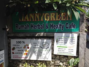 street side sign at Hanny Green Rumah Herbal and Healthy Cafe in Kuta