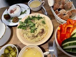 Wild garlic hummus at Hummus Amamamusi in Krakow