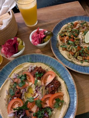 Sun-dried tomato a d chorizo hummus plate at Hummus Amamamusi in Krakow